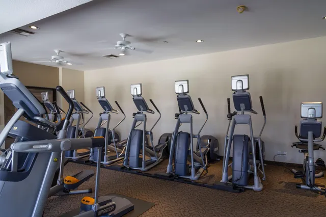 a view of a room with gym equipment