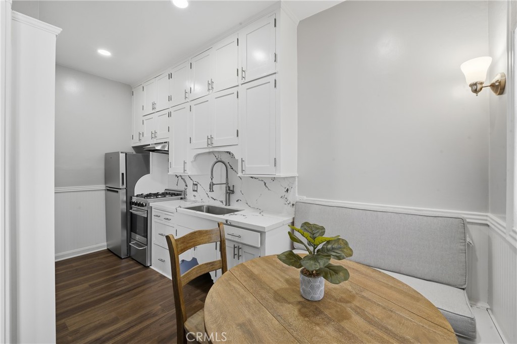 1030 East Ocean Boulevard, Unit 509 Long Beach, CA 90802 - Photo 14 of 39 a view of a kitchen with a sink and dishwasher