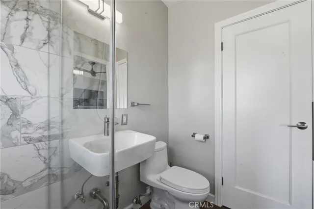 a bathroom with a sink and a toilet