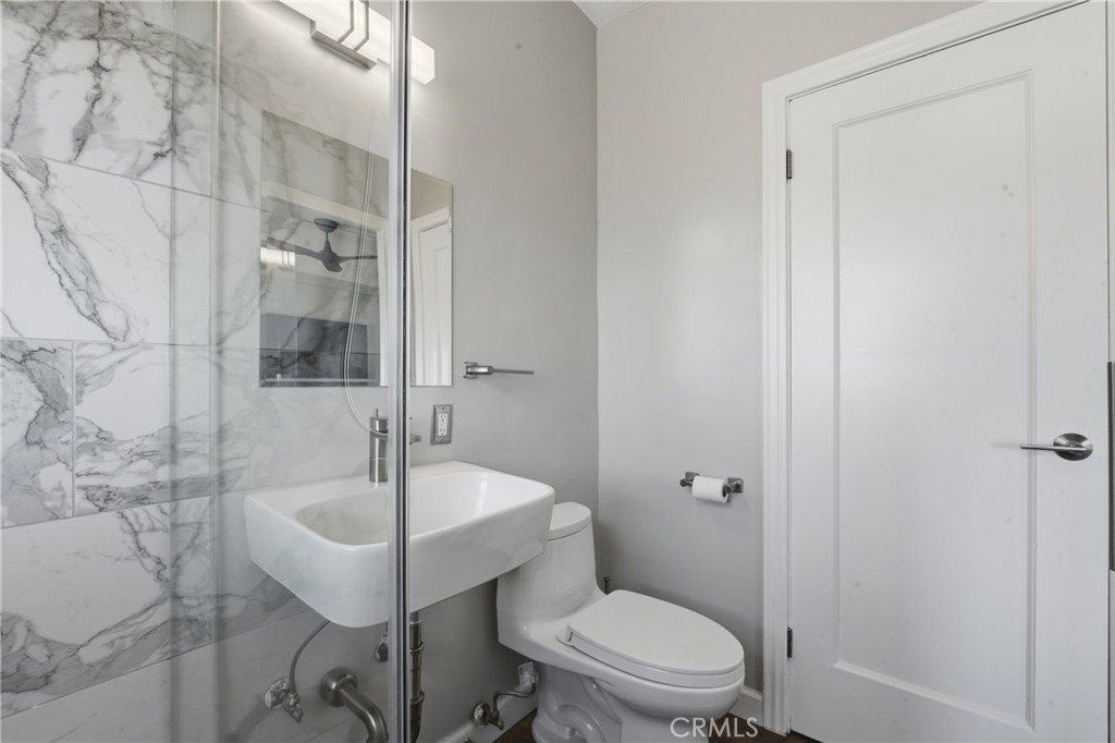 1030 East Ocean Boulevard, Unit 509 Long Beach, CA 90802 - Photo 18 of 39 a bathroom with a sink and a toilet
