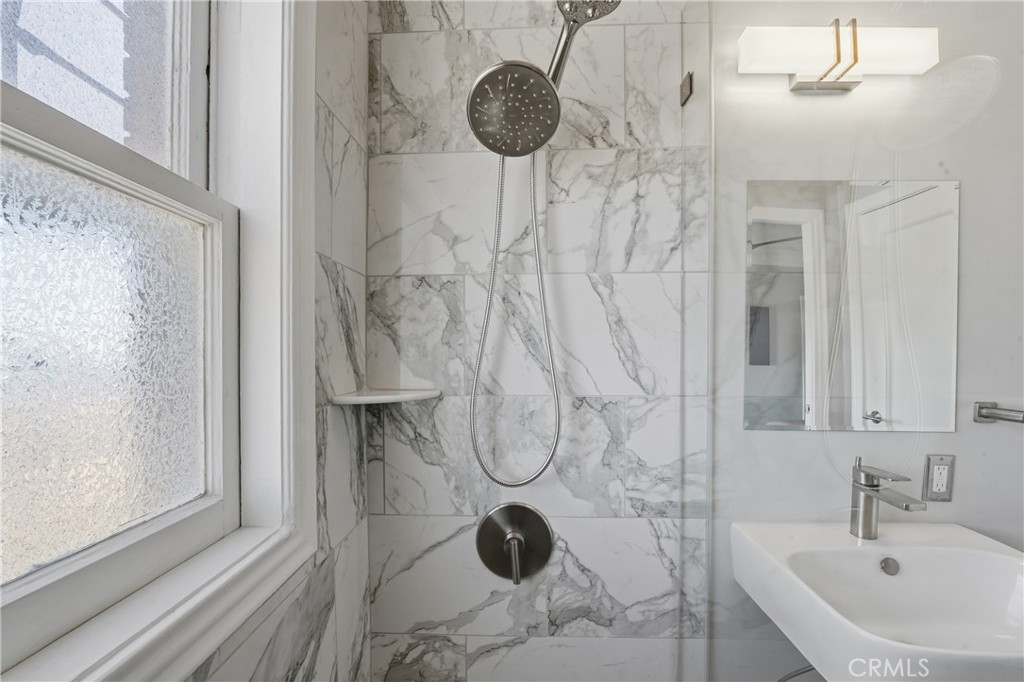 1030 East Ocean Boulevard, Unit 509 Long Beach, CA 90802 - Photo 20 of 39 a bathroom with a shower