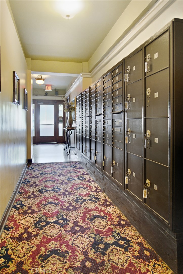 1030 East Ocean Boulevard, Unit 509 Long Beach, CA 90802 - Photo 25 of 39 a view of a hallway with wooden floor