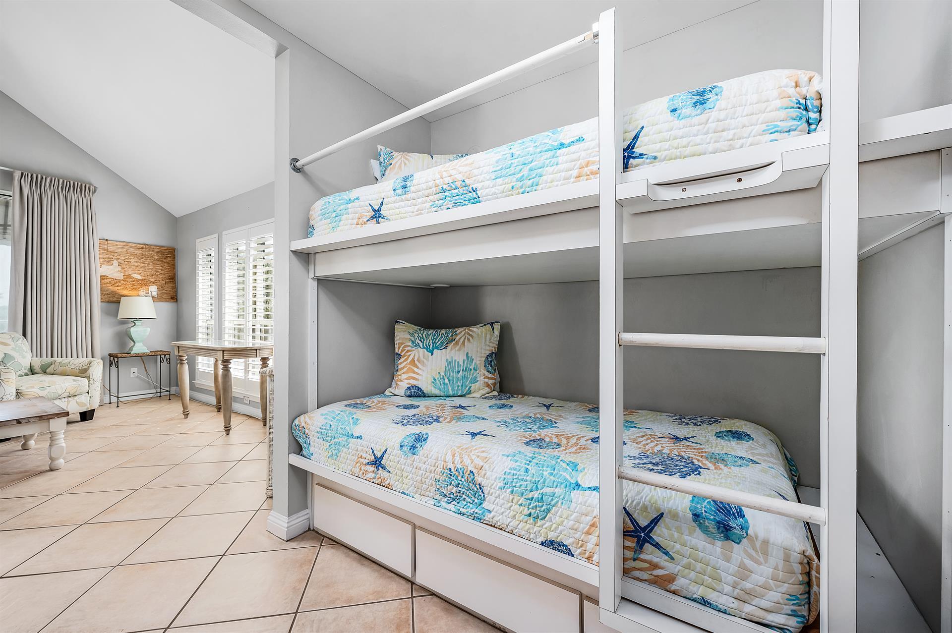 69 Crystal Beach Drive, Unit 8 Destin, FL 32541 - Photo 15 of 51 a bedroom with a bed and large windows