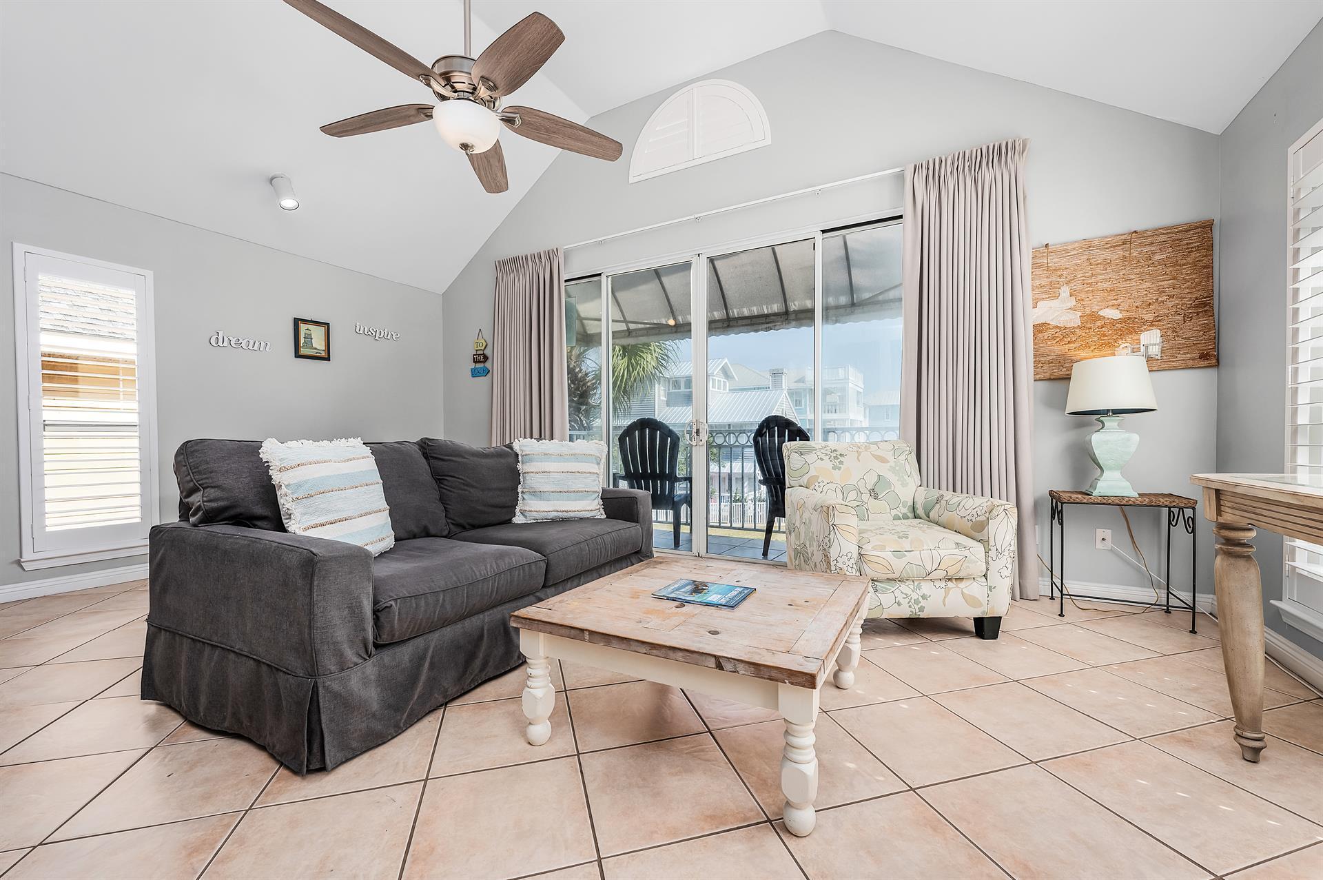 69 Crystal Beach Drive, Unit 8 Destin, FL 32541 - Photo 17 of 51 a living room with furniture and a large window