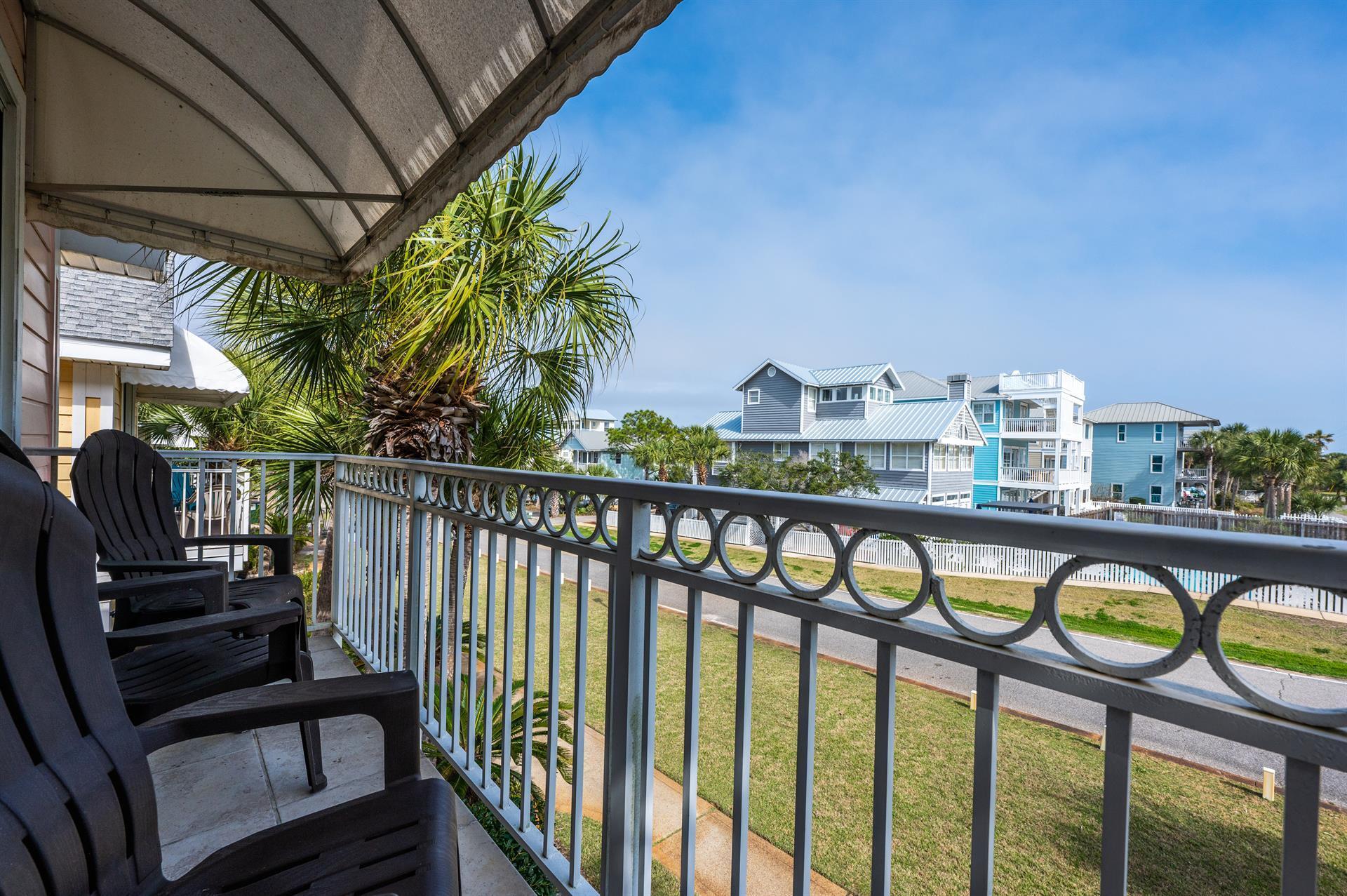 69 Crystal Beach Drive, Unit 8 Destin, FL 32541 - Photo 26 of 51 a view of a balcony with furniture