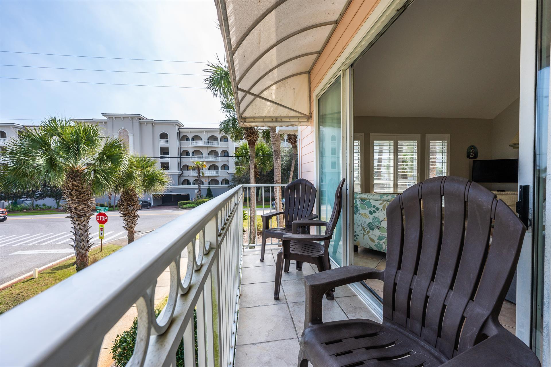 69 Crystal Beach Drive, Unit 8 Destin, FL 32541 - Photo 28 of 51 a view of balcony with furniture