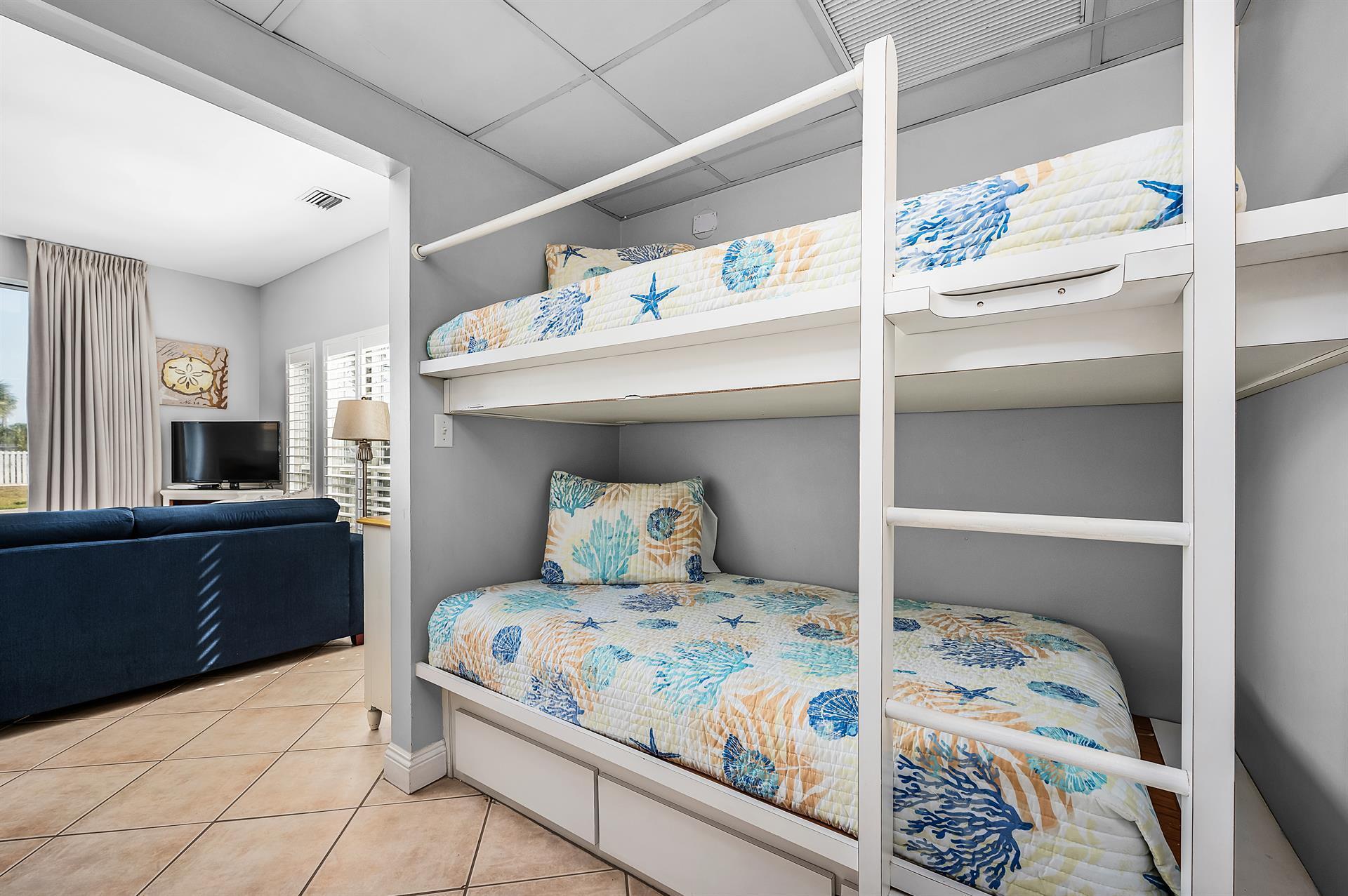 69 Crystal Beach Drive, Unit 8 Destin, FL 32541 - Photo 35 of 51 a bedroom with a bed and a dresser