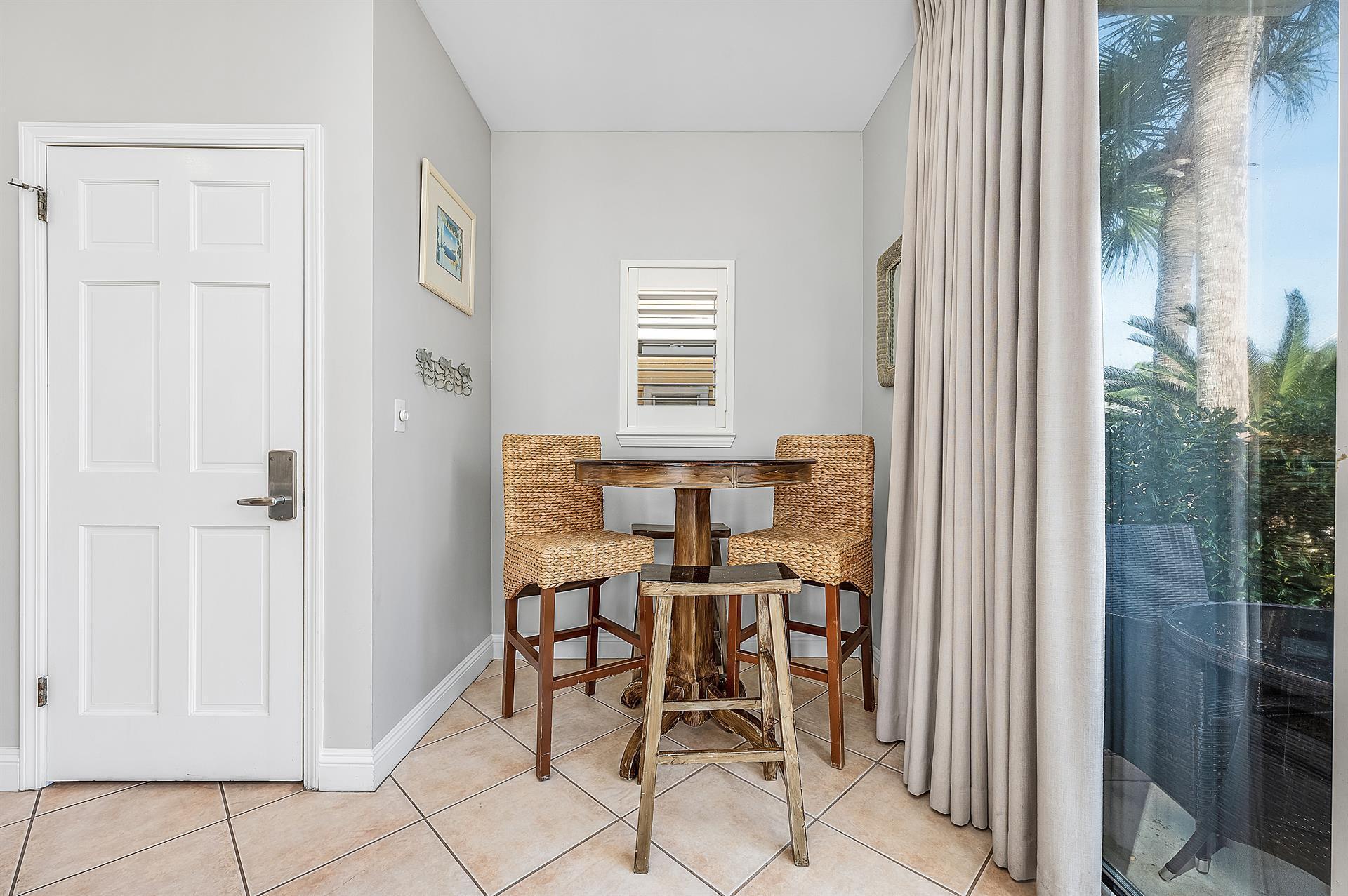 69 Crystal Beach Drive, Unit 8 Destin, FL 32541 - Photo 37 of 51 a view of a room that has a window and furniture