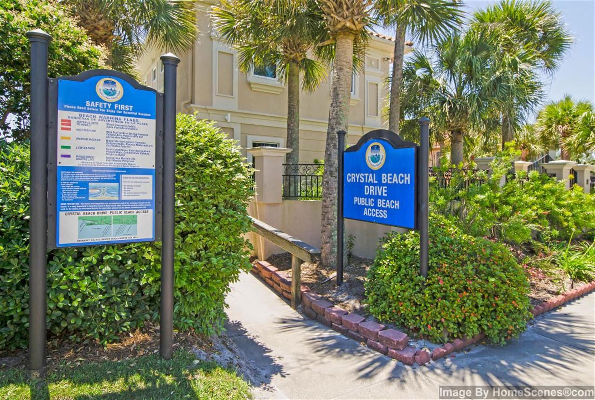 69 Crystal Beach Drive, Unit 8 Destin, FL 32541 - Photo 50 of 51 a sign that is on the side of a building