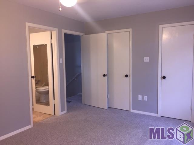 9853 Jefferson Highway, Unit F6 Baton Rouge, LA 70809 - Photo 10 of 21 Master Bedroom