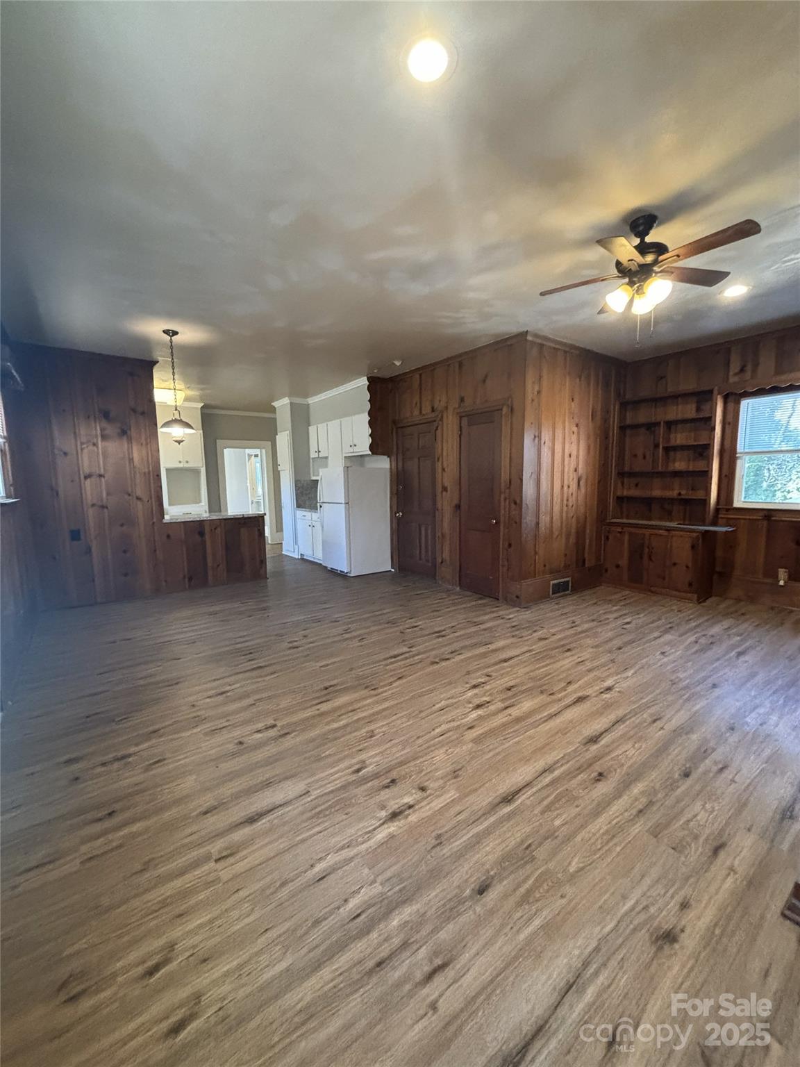 455 Spring Street Albemarle, NC 28001 - Photo 12 of 32 a view of an empty room with a window