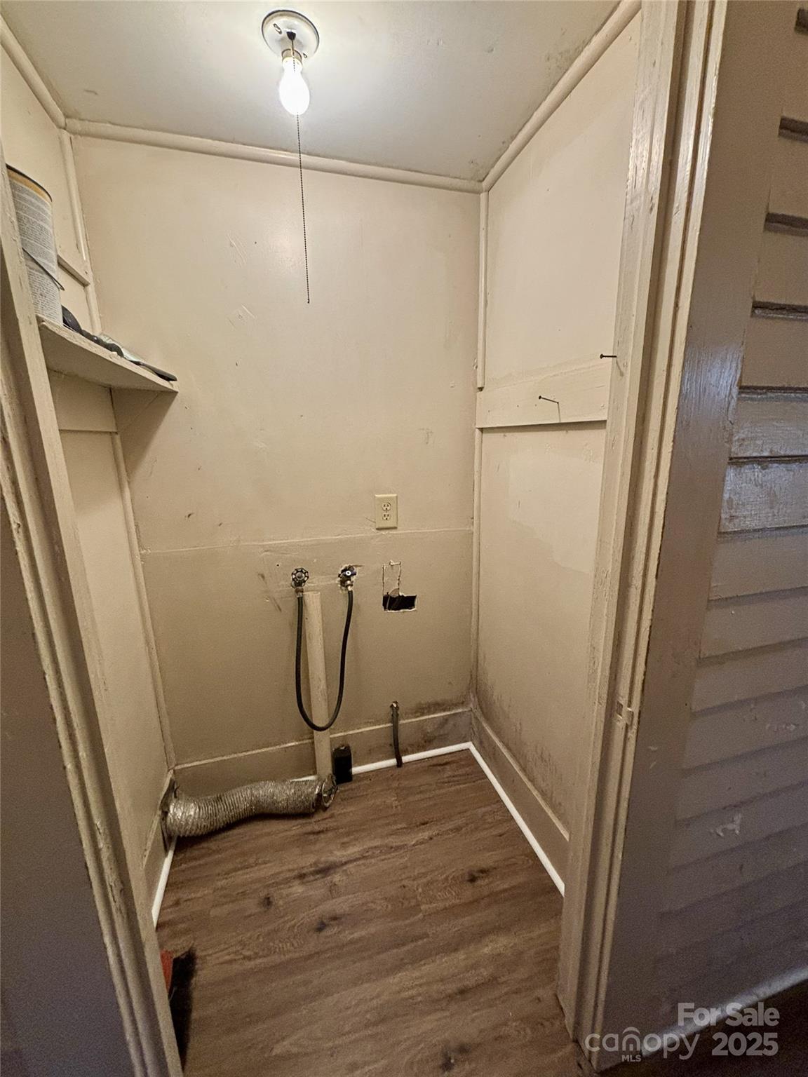 455 Spring Street Albemarle, NC 28001 - Photo 13 of 32 a view of a room with wooden floor and white wall
