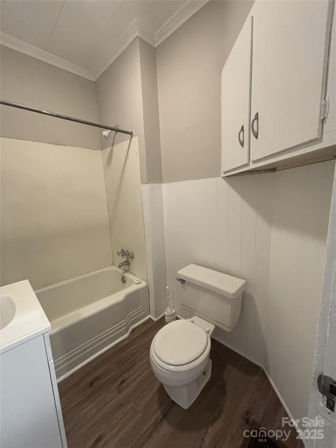 455 Spring Street Albemarle, NC 28001 - Photo 20 of 32 a bathroom with a toilet a sink and bathtub