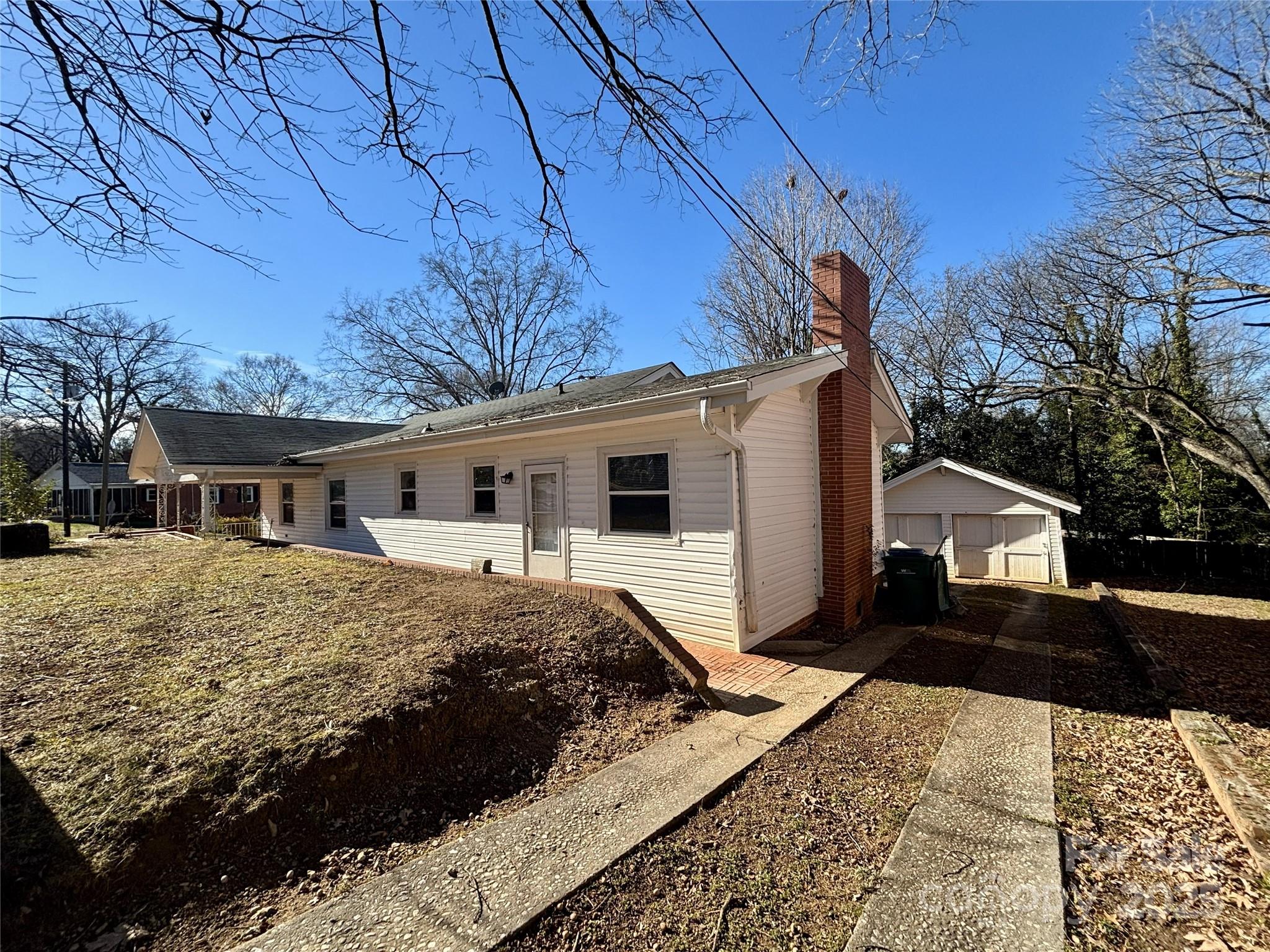 455 Spring Street Albemarle, NC 28001 - Photo 25 of 32 a front view of a house with a yard