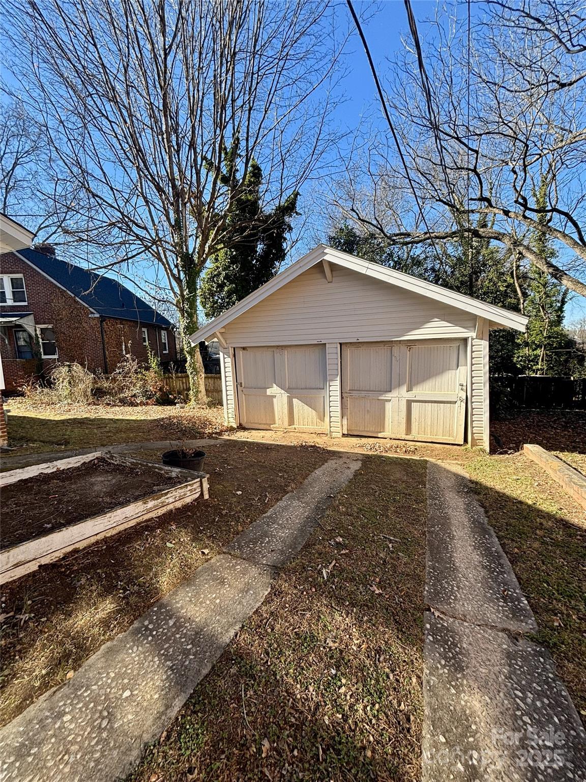 455 Spring Street Albemarle, NC 28001 - Photo 26 of 32 a front view of a house with a yard