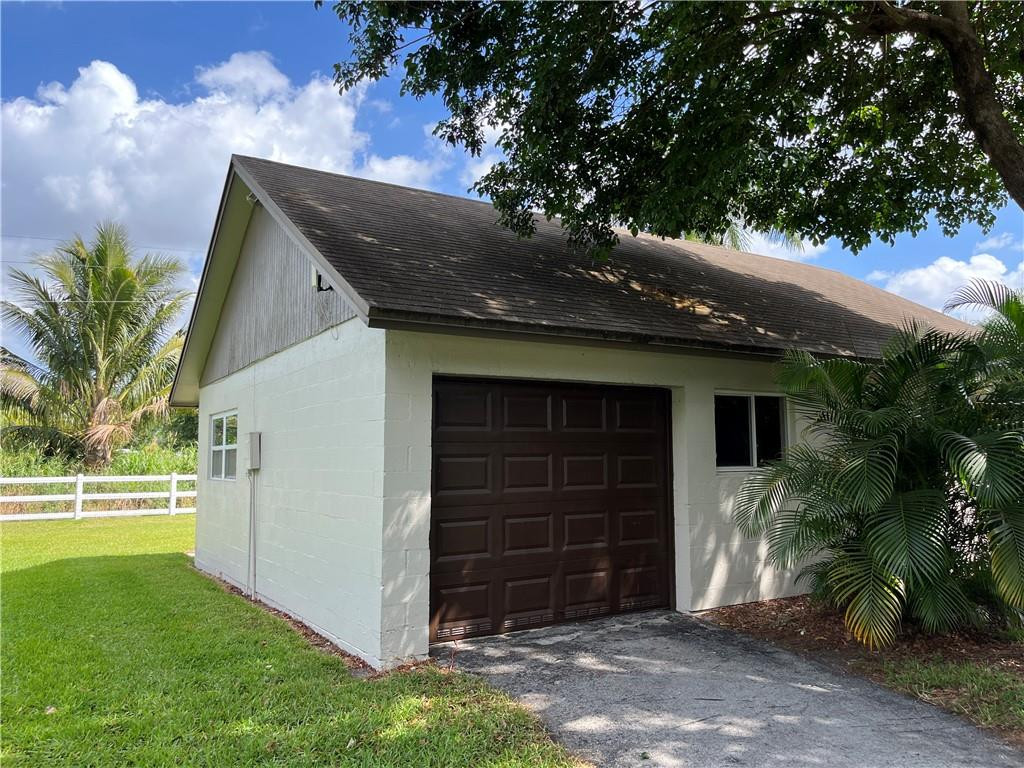 11301 Southwest 16th Street Davie, FL 33325 - Photo 2 of 54 a view of a house with a yard