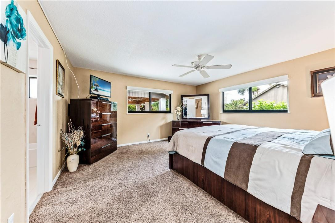 11301 Southwest 16th Street Davie, FL 33325 - Photo 26 of 54 a bed room with a bed and a tv