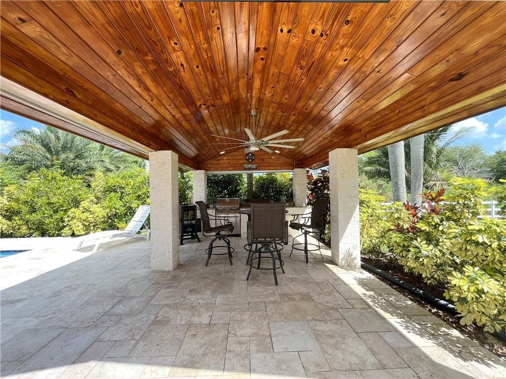 11301 Southwest 16th Street Davie, FL 33325 - Photo 38 of 54 a view of a patio with table and chairs and potted plants