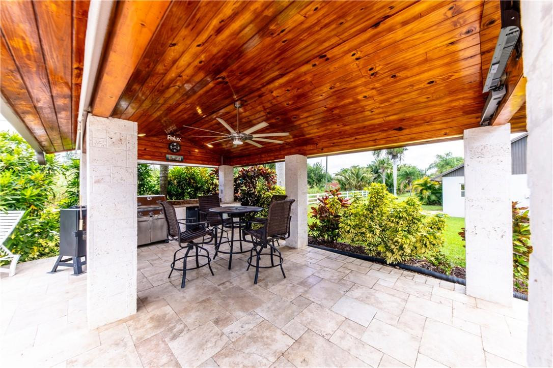 11301 Southwest 16th Street Davie, FL 33325 - Photo 40 of 54 a patio with plants and outdoor seating