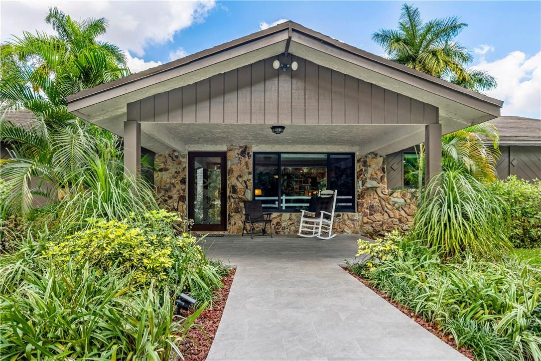 11301 Southwest 16th Street Davie, FL 33325 - Photo 41 of 54 a front view of a house with patio