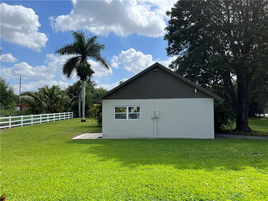 11301 Southwest 16th Street Davie, FL 33325 - Photo 43 of 54 a view of a backyard with a garden