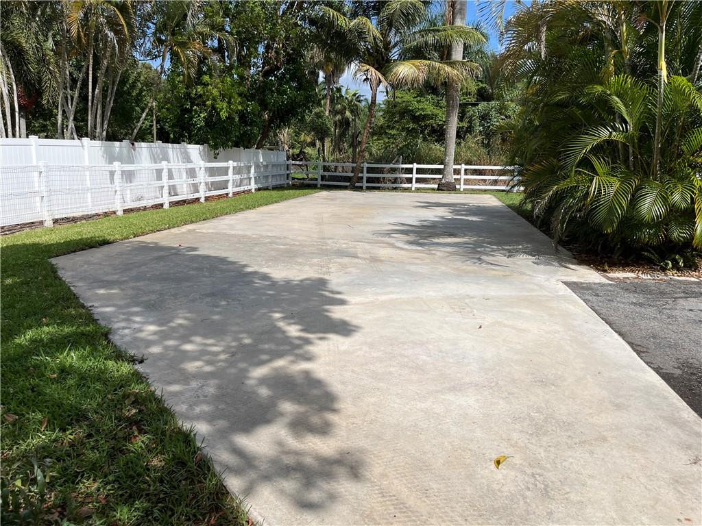 11301 Southwest 16th Street Davie, FL 33325 - Photo 5 of 54 a view of a backyard of the house