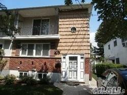 View of front facade with a balcony