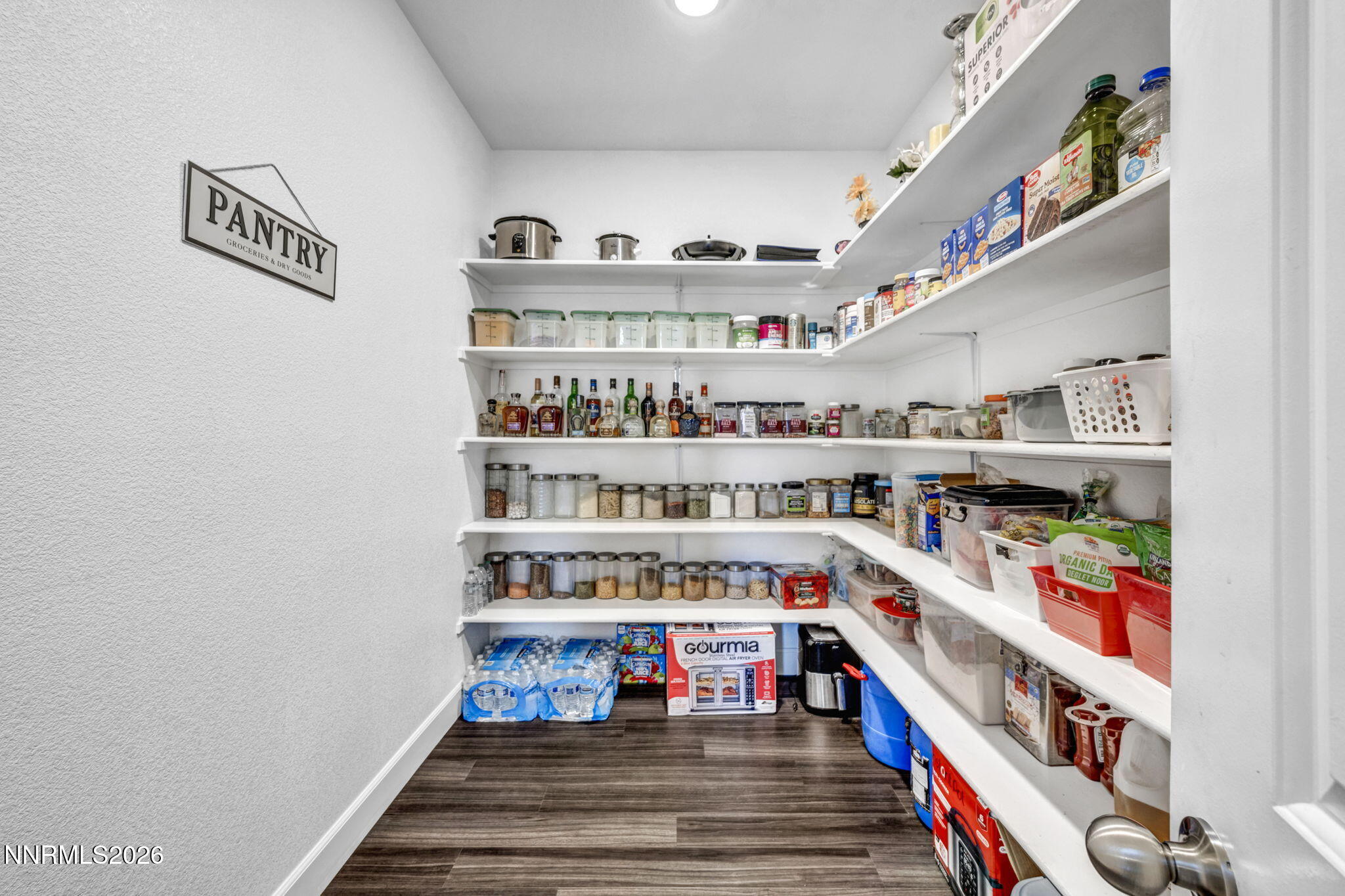 969 Estuary Circle Reno, NV 89506 - Photo 15 of 38 a room with lots of books and baby