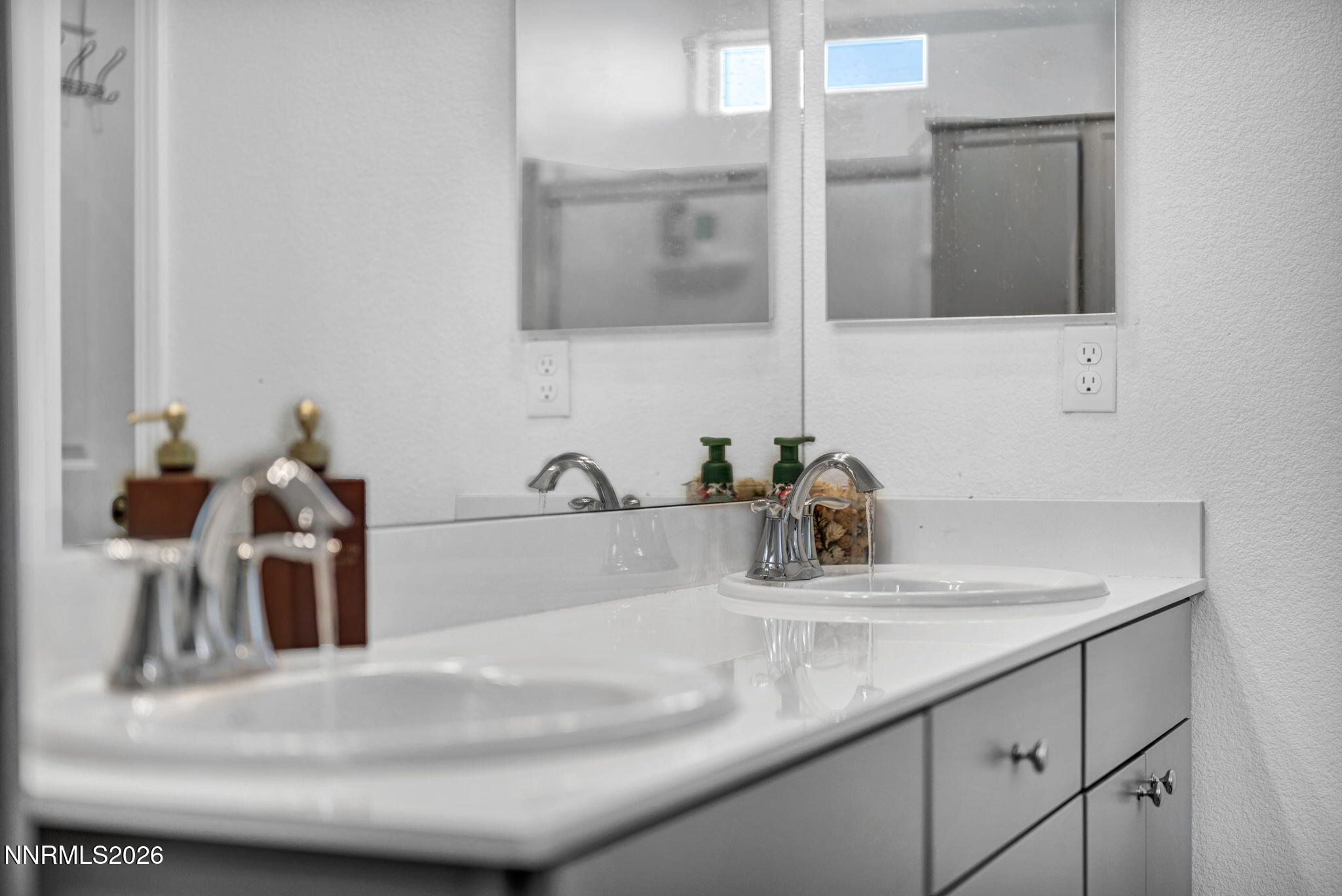 969 Estuary Circle Reno, NV 89506 - Photo 30 of 38 a bathroom with a sink and a mirror