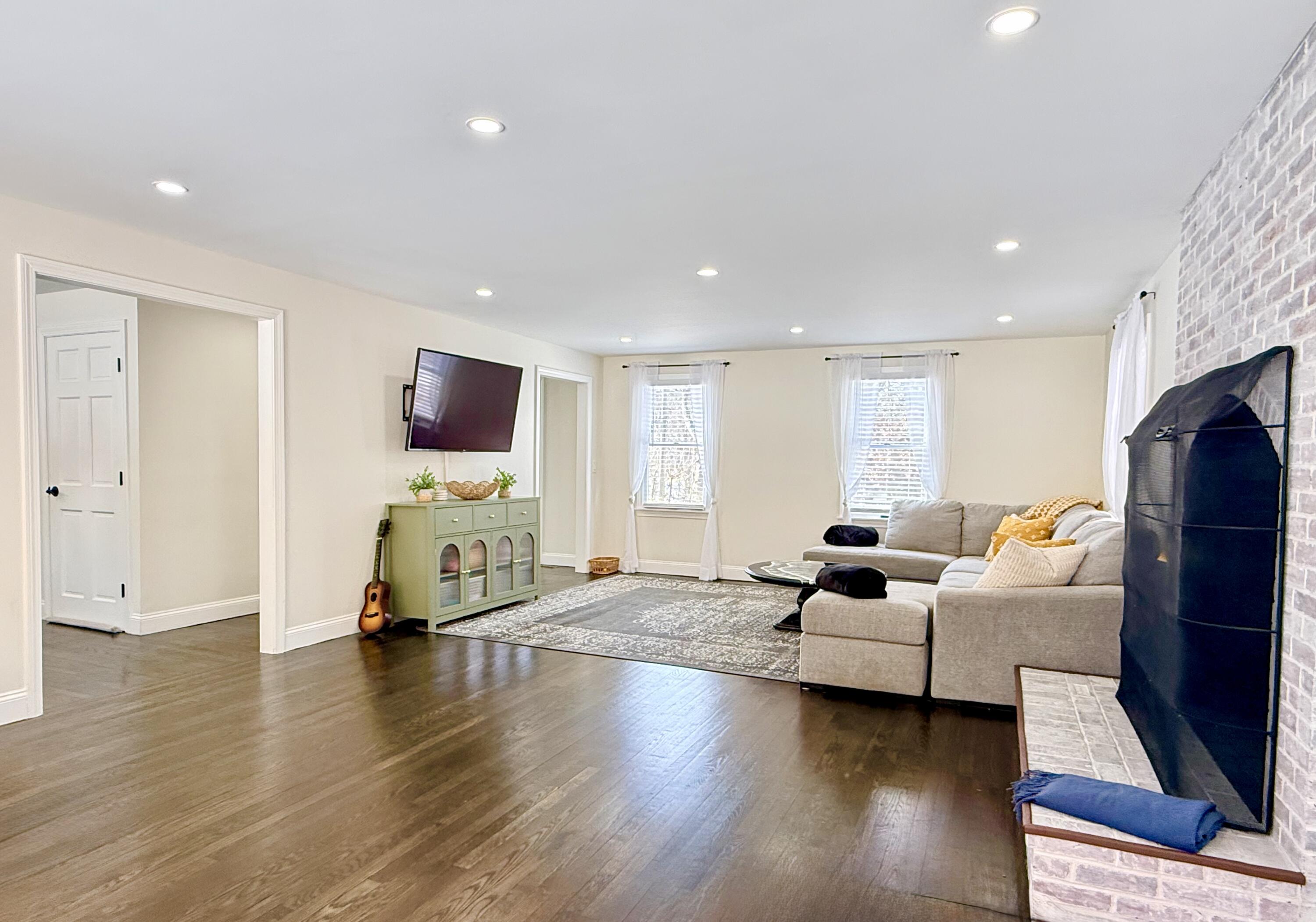 117 A P Newcomb Road Brewster, MA 02631 - Photo 17 of 69 a living room with furniture and a flat screen tv