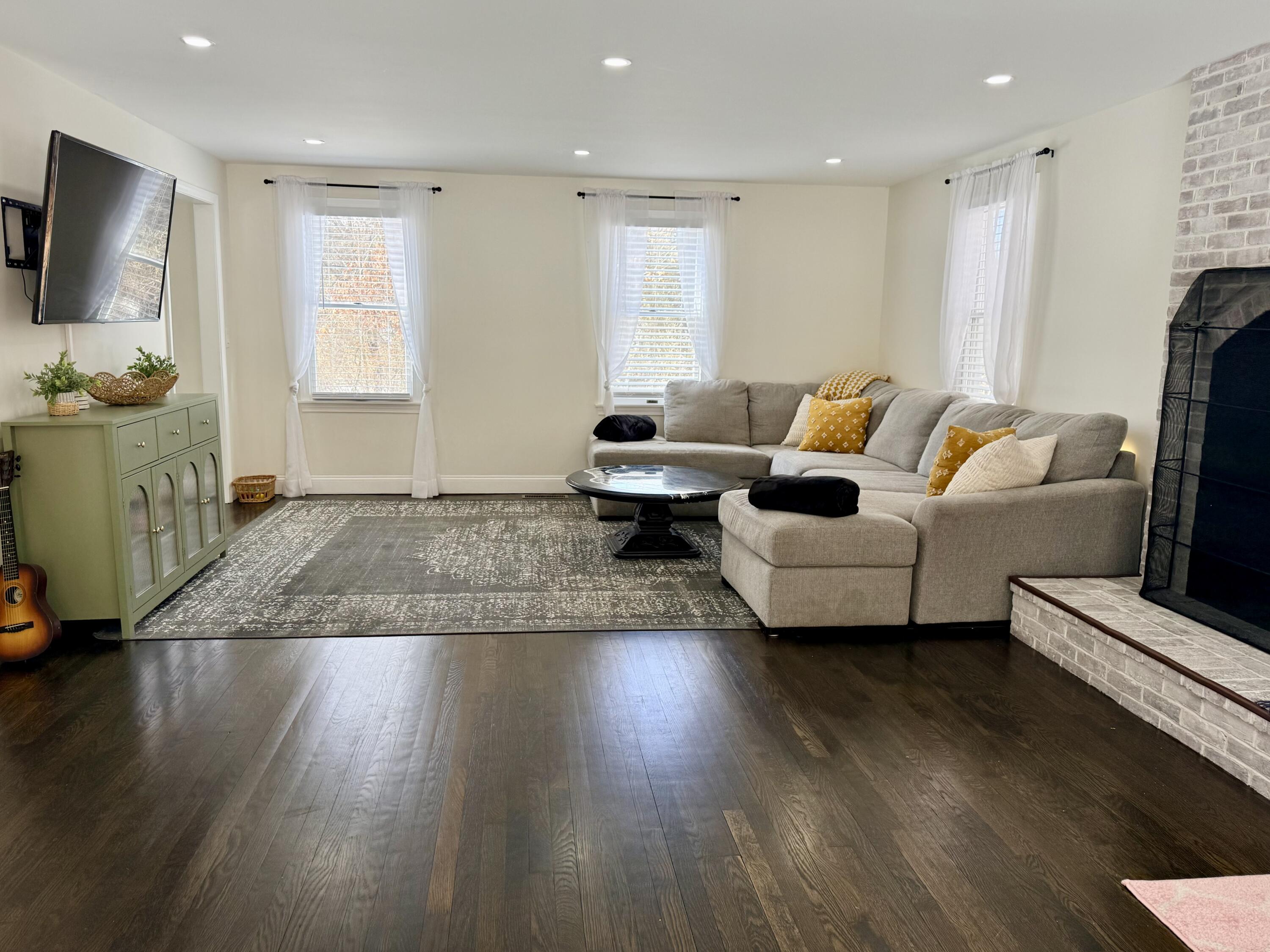 117 A P Newcomb Road Brewster, MA 02631 - Photo 18 of 69 a living room with furniture and a flat screen tv