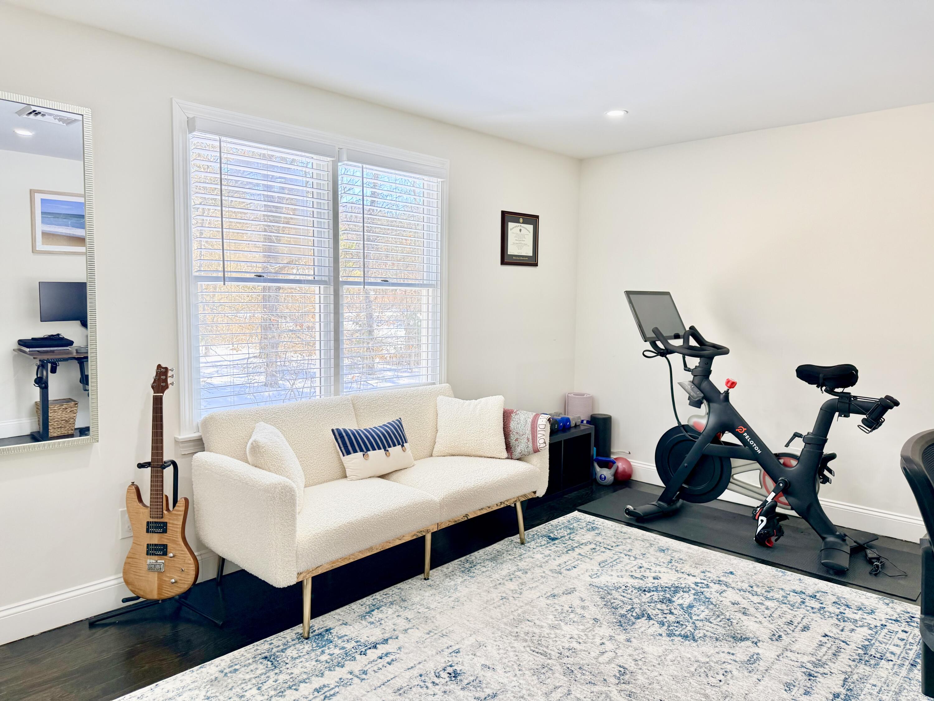 117 A P Newcomb Road Brewster, MA 02631 - Photo 33 of 69 a living room with furniture a wooden floor and a window