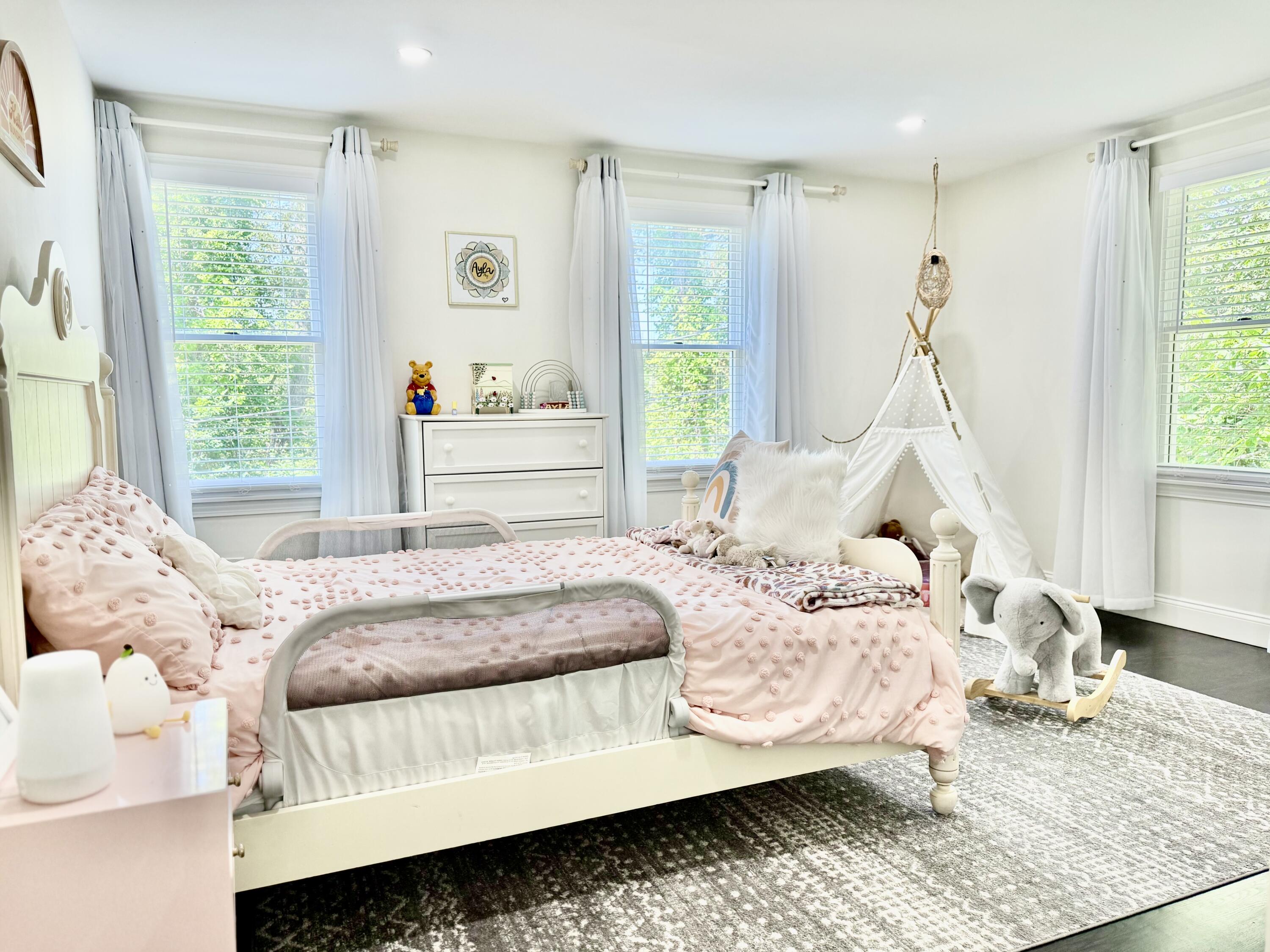 117 A P Newcomb Road Brewster, MA 02631 - Photo 38 of 69 a bedroom with a bed and a window
