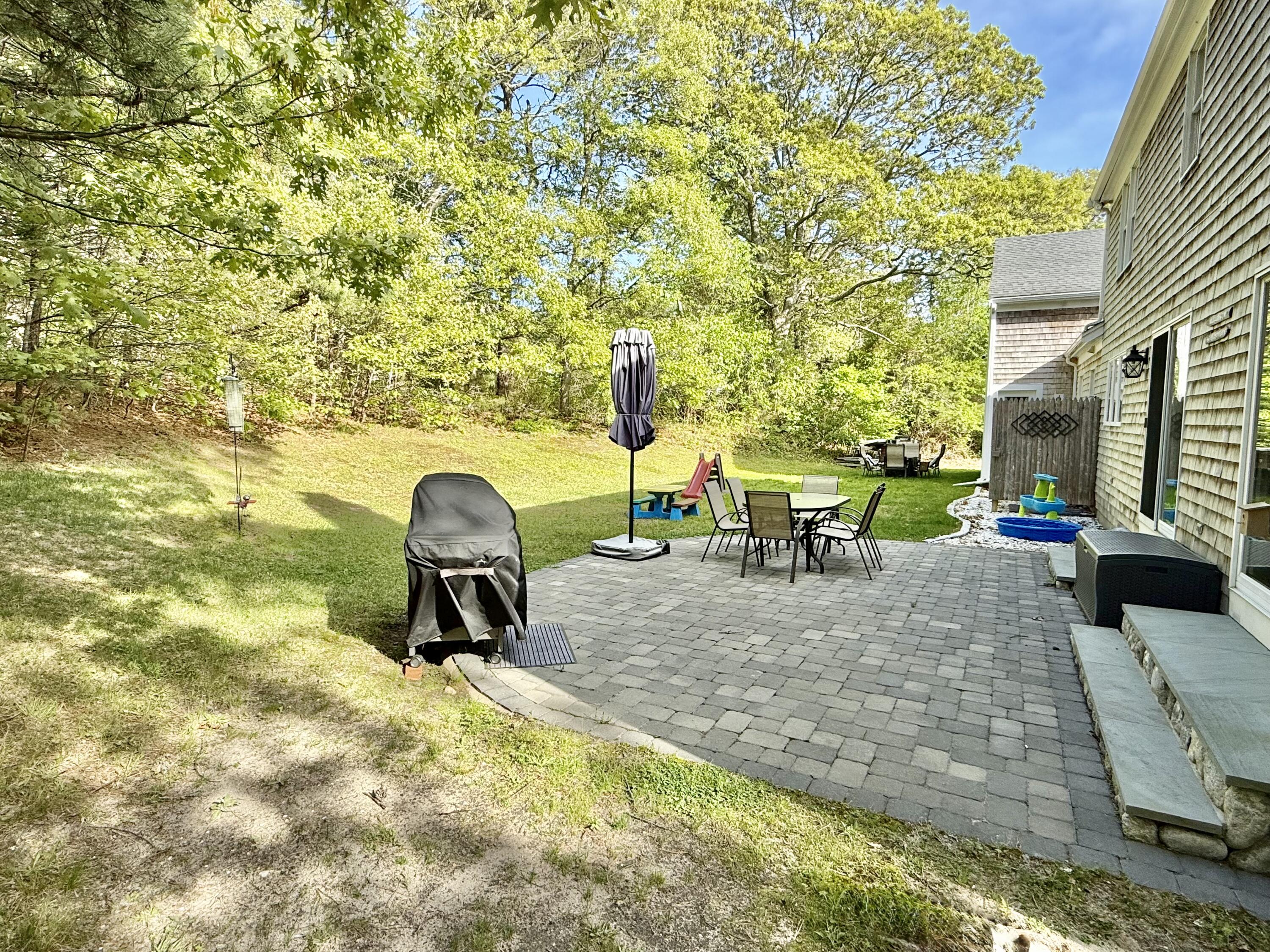 117 A P Newcomb Road Brewster, MA 02631 - Photo 61 of 69 a view of a bench in a backyard