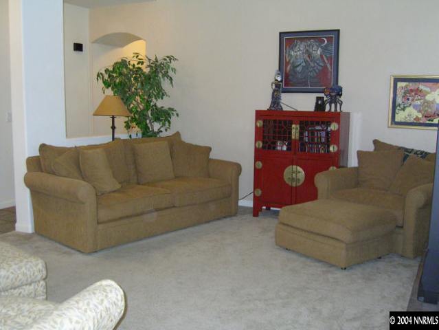 9965 Rio Bravo Drive Reno, NV 89521 - Photo 4 of 6 a living room with furniture and a potted plant