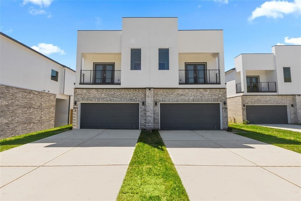 a house view with a garden space