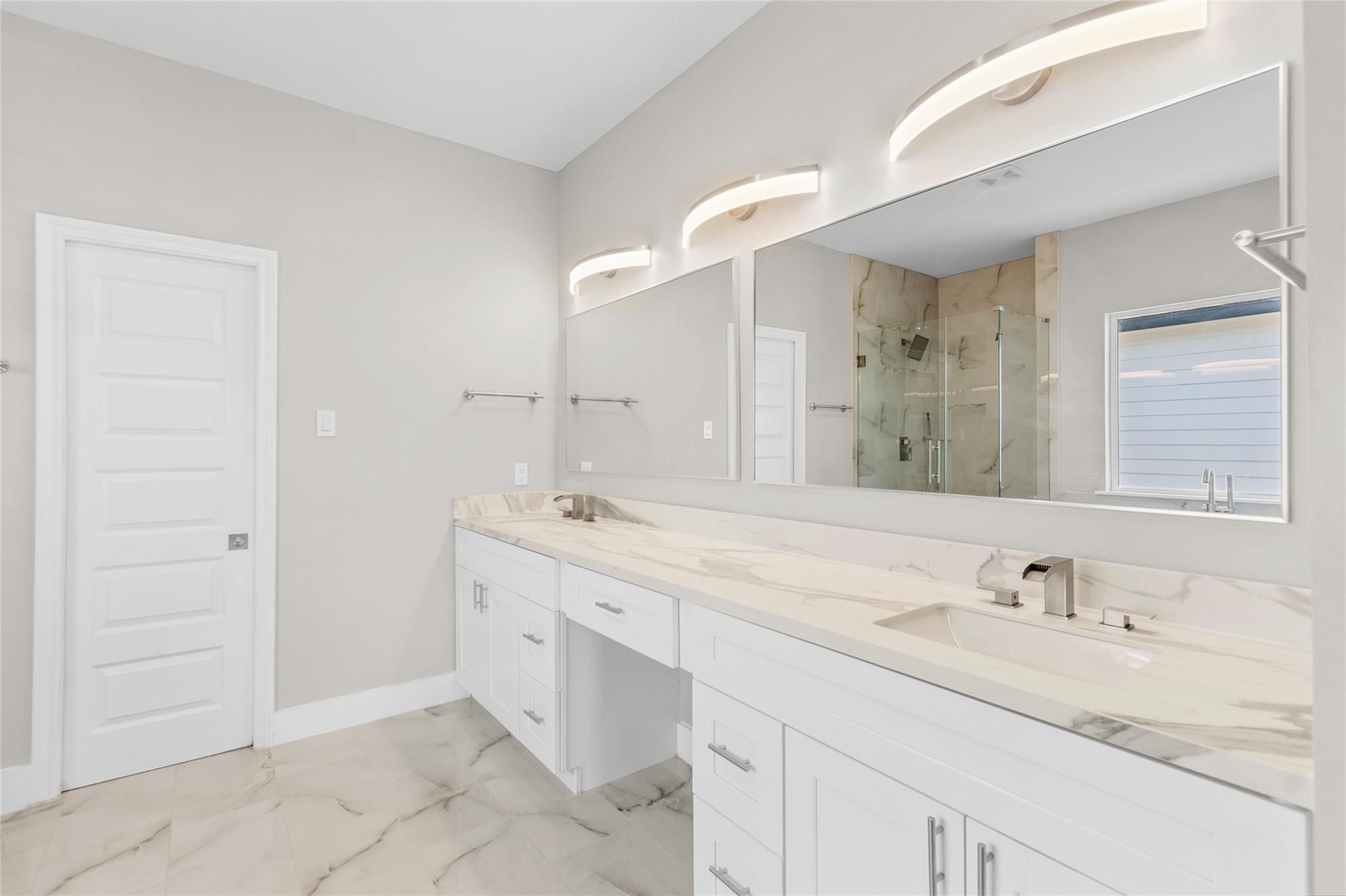 5506 Pershing Street Houston, TX 77033 - Photo 13 of 29 a bathroom with a granite countertop sink and a mirror