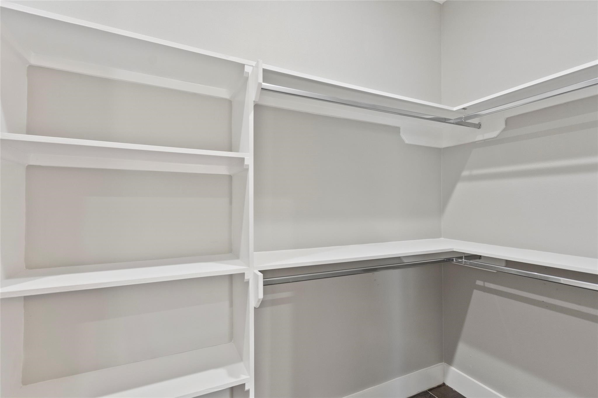 5506 Pershing Street Houston, TX 77033 - Photo 20 of 29 a view of an empty walk in closet