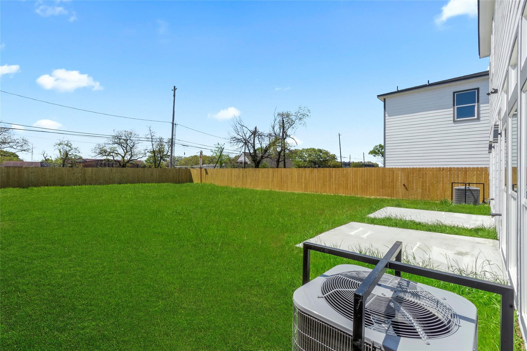 5506 Pershing Street Houston, TX 77033 - Photo 26 of 29 a view of a backyard with sitting area