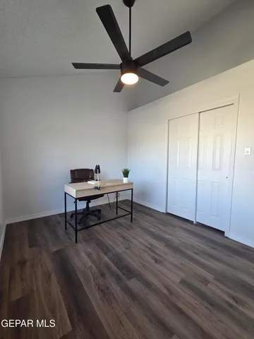 a storage room with wooden floor