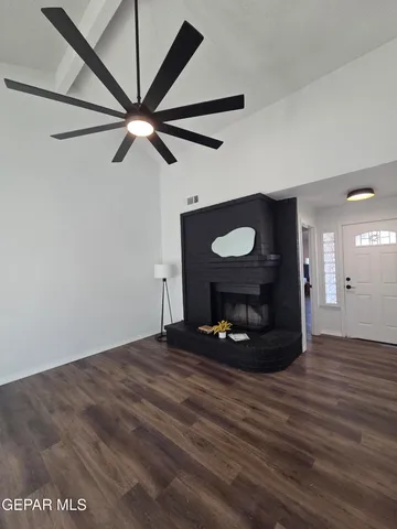 a view of a livingroom with wooden floor