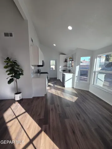a kitchen with a stove and a microwave