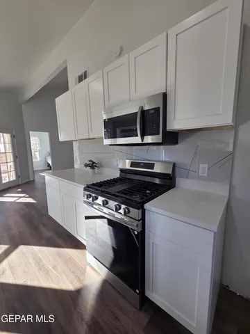 a view of a livingroom with furniture