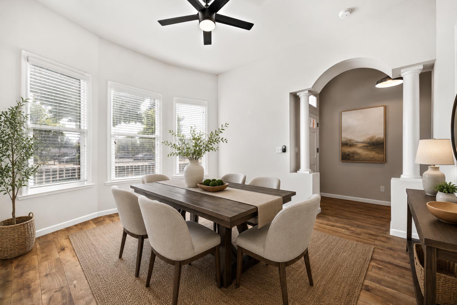 1320 P Street Fresno, CA 93721 - Photo 4 of 12 a view of a dining room with furniture and wooden floor
