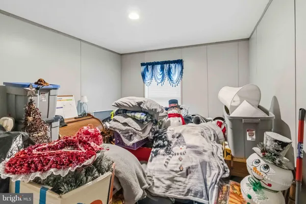 a bedroom with furniture and a bed
