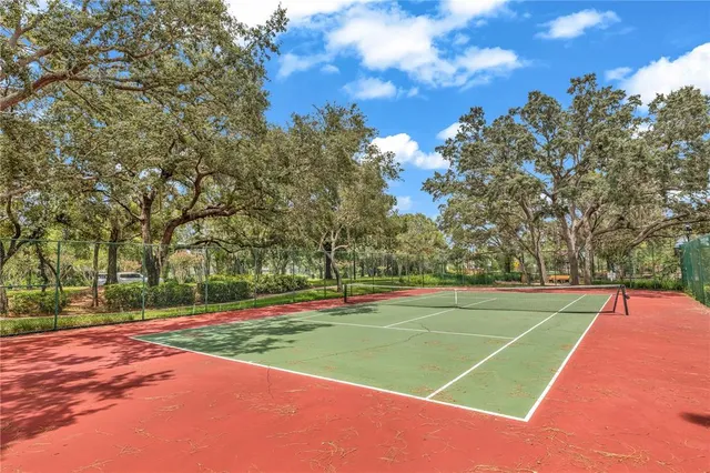 a view of a house with a park