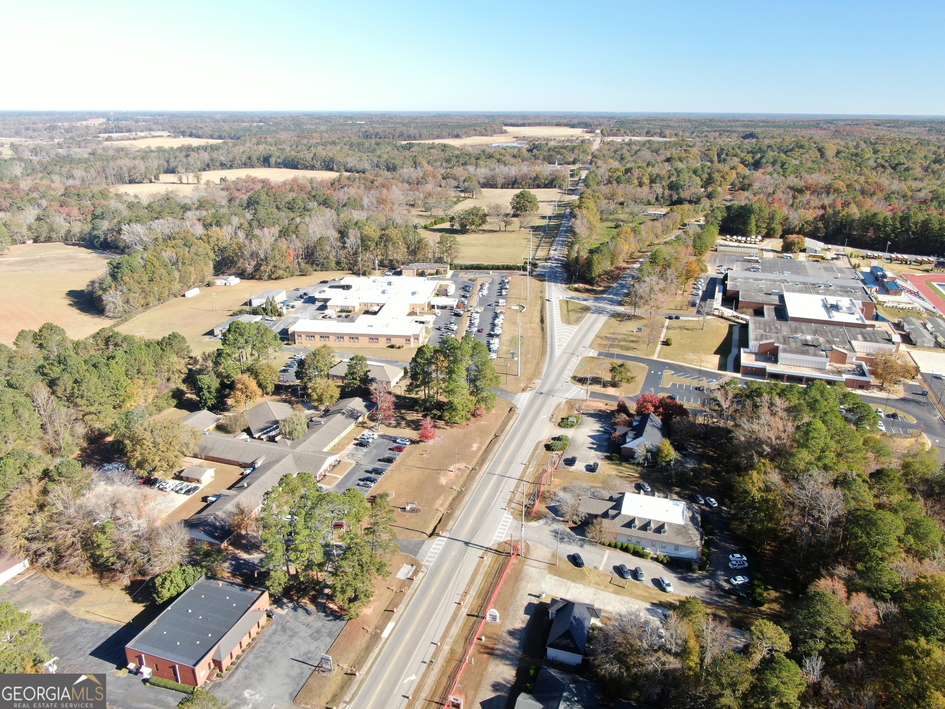 103 Greensboro Road Eatonton, GA 31024 - Photo 17 of 23 an aerial view of residential building with parking space