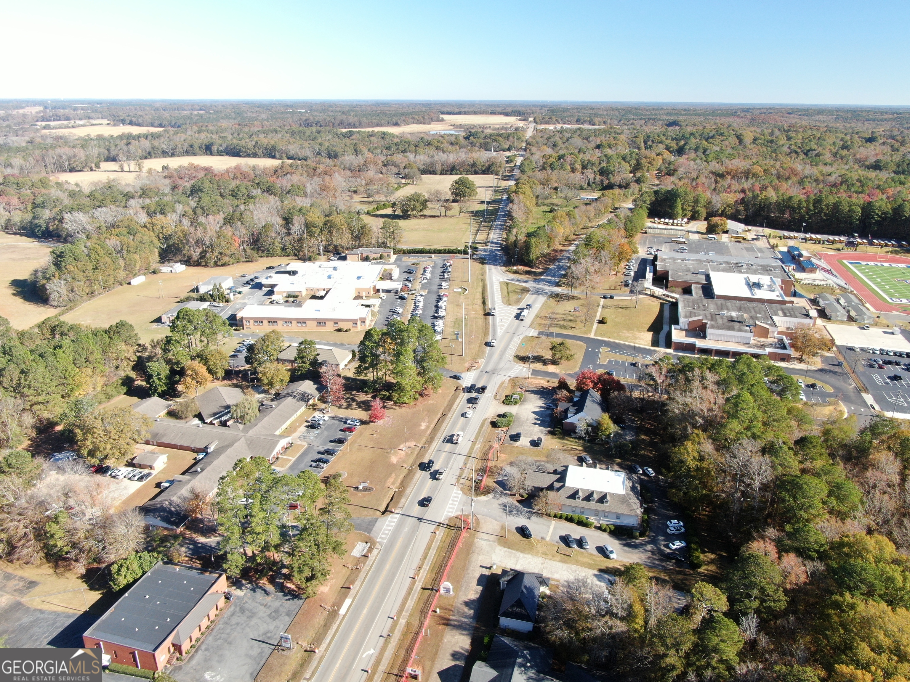 103 Greensboro Road Eatonton, GA 31024 - Photo 23 of 23 an aerial view of a city with lots of residential buildings