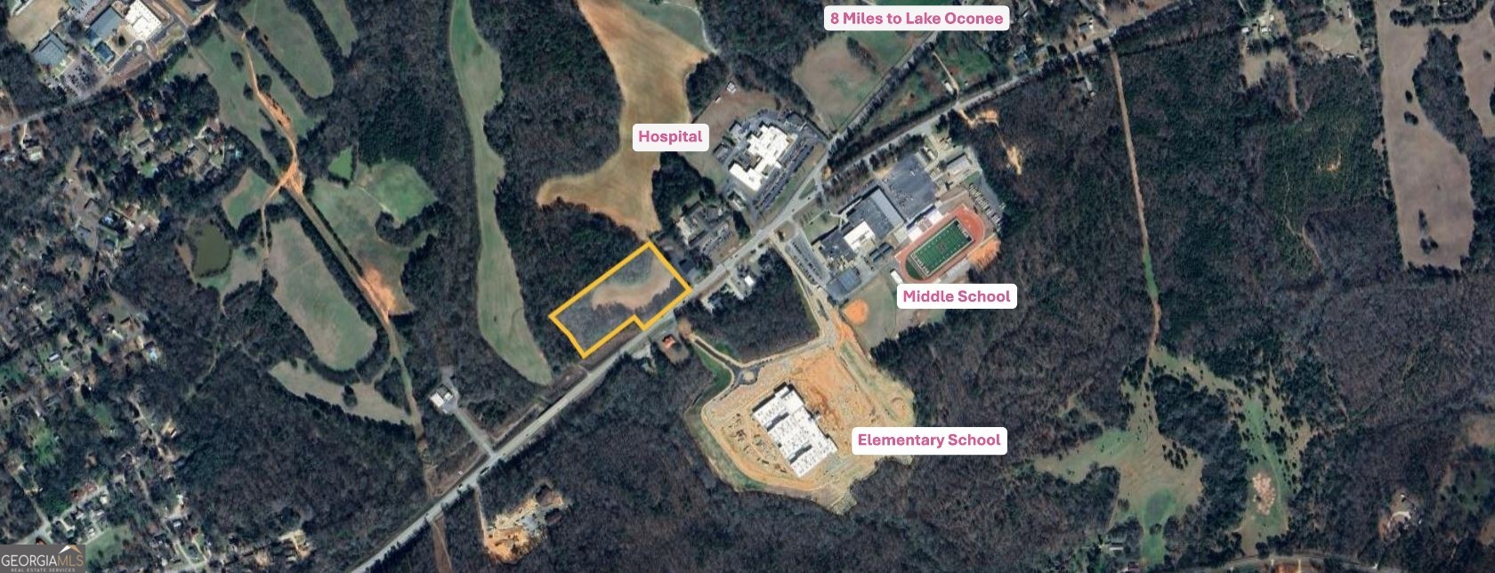 103 Greensboro Road Eatonton, GA 31024 - Photo 3 of 23 a view of a pathway with a tree in the background