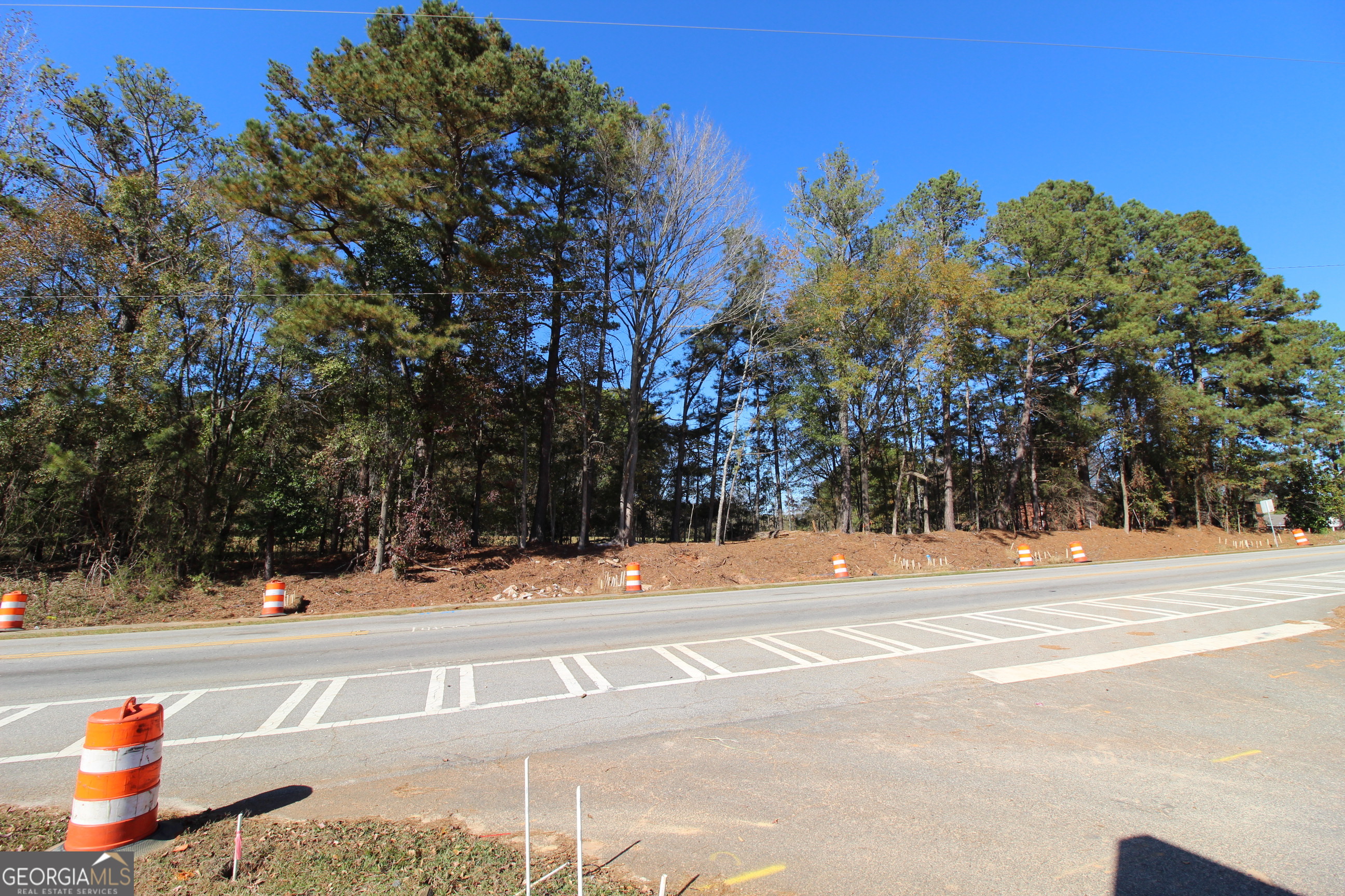103 Greensboro Road Eatonton, GA 31024 - Photo 4 of 23 a view of a backyard of the house